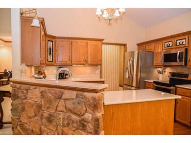 Kitchen has vaulted ceilings.