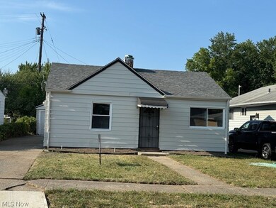 Bungalow-style home featuring a front lawn