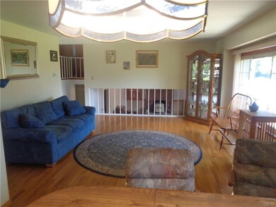 LARGE LIVING ROOM WITH HARDWOODS THRU-OUT!