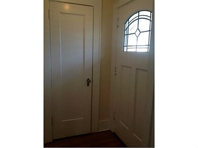 Foyer. The leaded glass door leads into a front Fo