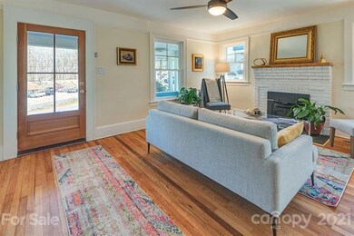 Living room with refurbished original hardwood flo