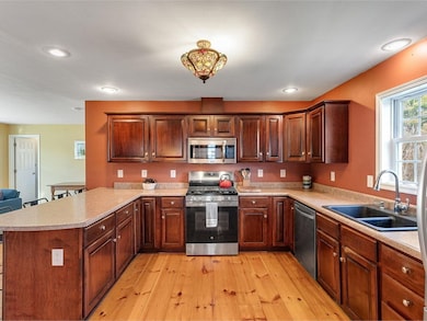 Kitchen with cherry cabinets
