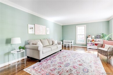 The living room is light & bright.