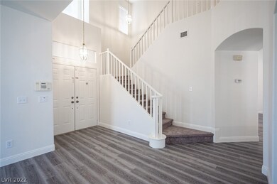 Just off the living room are the stairs that lead