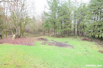 Back yard to enjoy. Treed area beyond to back of p