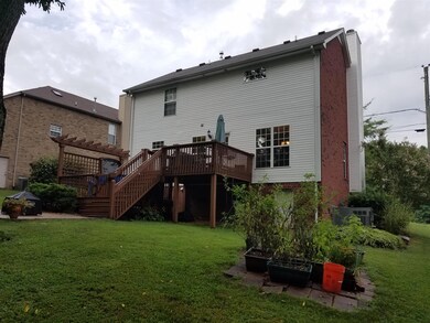 Back of Home Showing spacious backyard