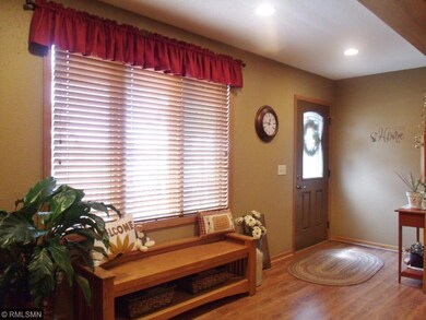 Step inside the spacious sun-filled foyer, with pl