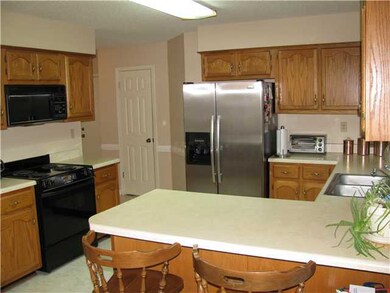 Kitchen has plenty of counter and storage space wi