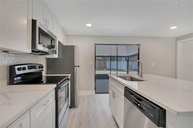 3723 Meadowbreeze Dr, Tampa, FL 33619 - photo 6