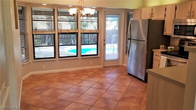 View of Pool from Livingroom/Kitchen