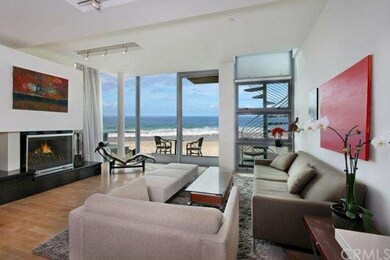 Formal Living Room with Romantic Fireplace, a Balc