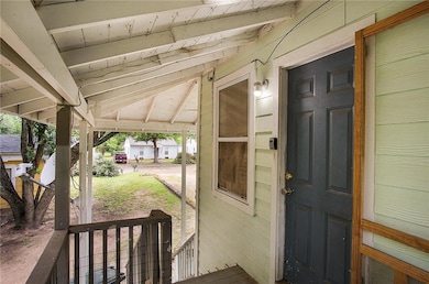 Entrance to property with a porch