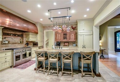 Large island with plenty of extra seating, copper 