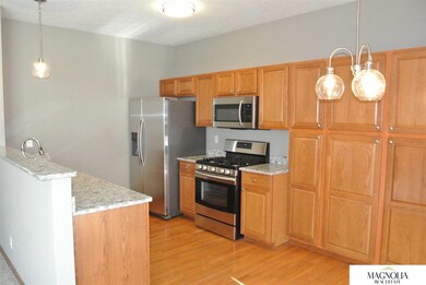 stainless steel appliances - brand new refrigerator, microwave, dishwasher, garbage disposal, sink and faucet.  Gas stove is less than a year old.