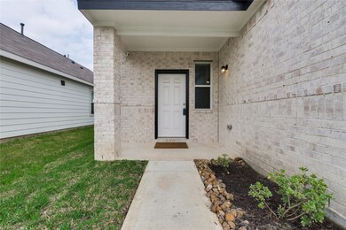 Brick walk up with modern colors and landcscaping