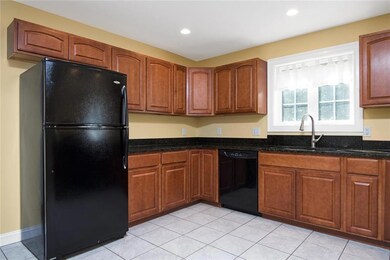 Spacious kitchen with granite...