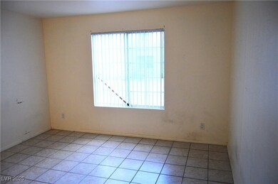 Spare room featuring light tile patterned flooring