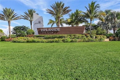 Community / neighborhood sign with a lawn