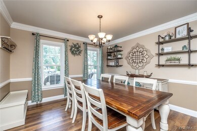 Dining space featuring dark hardwood / wood-style