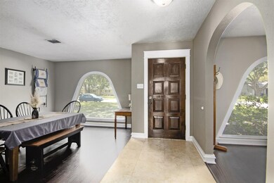 Travertine and wood flooring