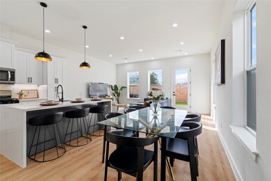 Step inside to a bright, open layout where the kitchen, dining, and living spaces flow seamlessly together, creating the perfect setting for gatherings or cozy nights in. This functional floor plan invites connection and makes every moment feel effortlessly welcoming.