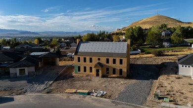 Aerial view of residential area with a mountainous background