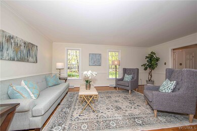 The graciously sized Living Room is ready for ente