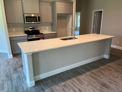 1403 S Clements St, Gainesville, TX 76240 - photo 7