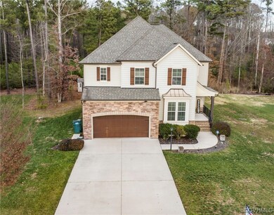 View of front of property featuring a garage and a