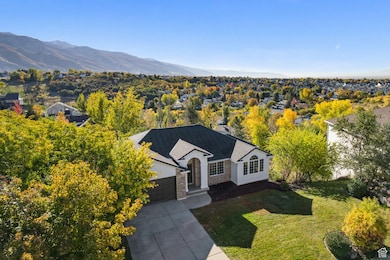 View of subject property with mountains