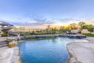 The pool, spa, slide, and waterfalls will provide 