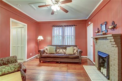 Another cozy living area with 2nd decorative fireplace