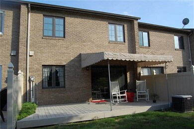Deck at the rear of the home - awning provides gre