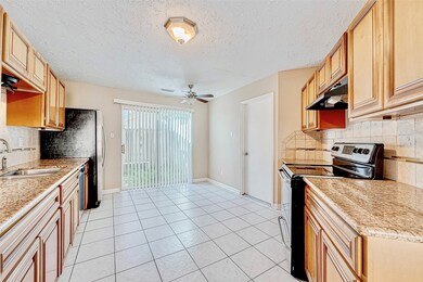 A close up to the countertops and cabinetry