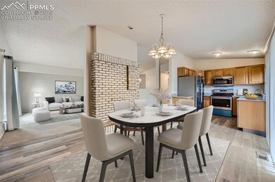 Virtually Staged -Dining area featuring luxury vin