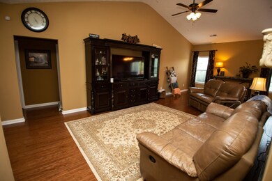 Beautiful, warm great room is wired for surround sound.  Just add your speakers!