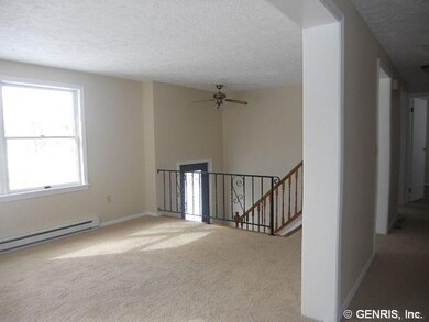 Living Room. Nice size living room.  Hallway to be