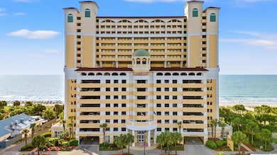 View of building exterior featuring a water view