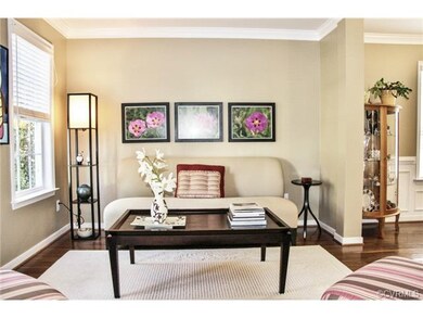 Formal living room with oak hardwood floors, doubl