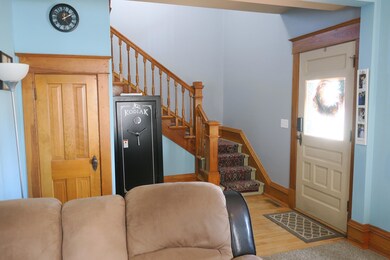 Living room open to foyer