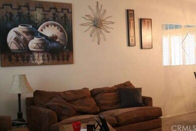Living room connected to the formal dining area