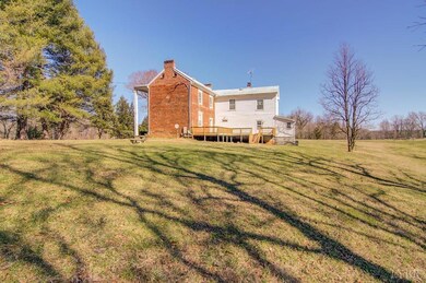 Right side of home showcasing Huge deck