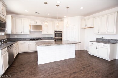 Wide open kitchen/living room with balcony