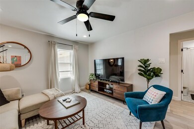 Living room featuring a ceiling fan, recessed ligh