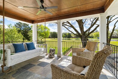 Upstairs porch overlooking Temple Hills Golf Course.