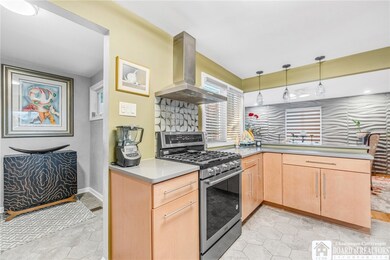 Elegant foyer leads to magnificent kitchen