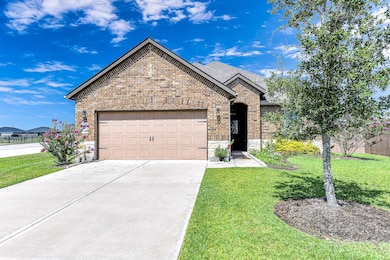 Plenty of guest parking with this two car garage and driveway.