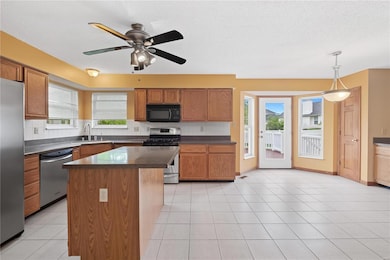 Kitchen has breakfast bar on island and breakfast 
