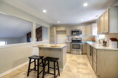 All new kitchen featuring granite, new cabinets an