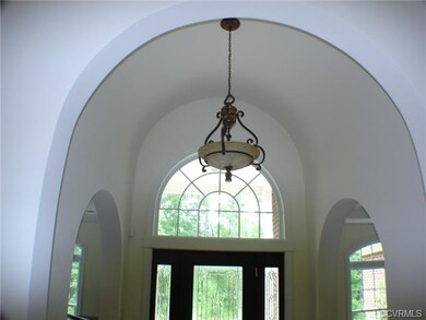 Entrance foyer 7x10 with a vaulted barrel ceiling.